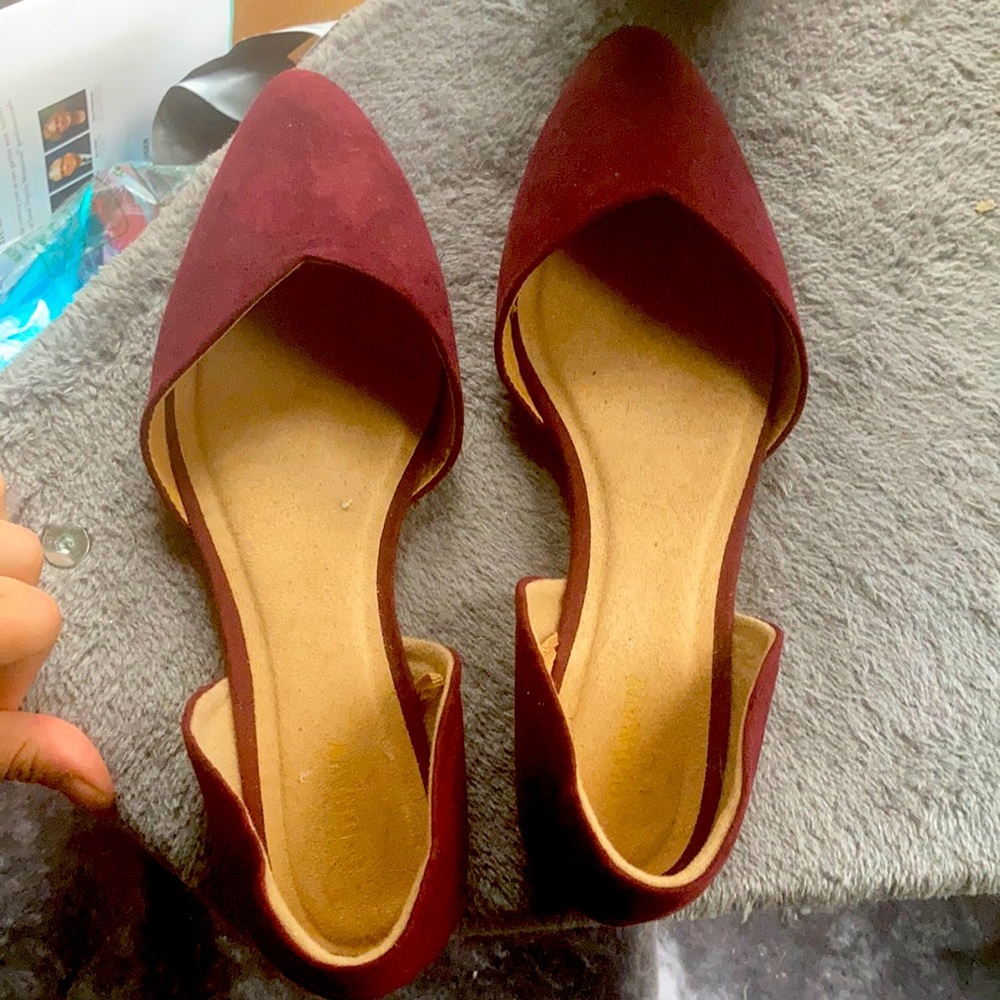 Red slip on pointed shoes